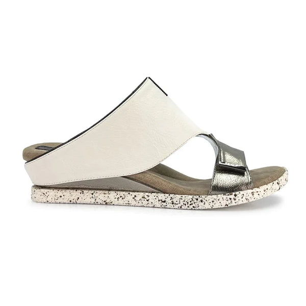 Kleo_white_flips_to_black_side_view_of_white_single_shoe