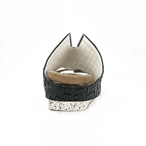 Kleo white flips to black single shoe in black back of shoe view