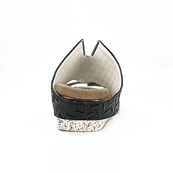 Kleo white flips to black single shoe in black back of shoe view